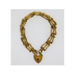 A small 9ct gold child's gate bracelet, 3in long,