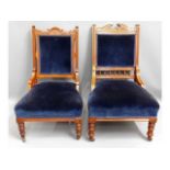 A pair of upholstered Edwardian mahogany low level