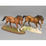 Two Doulton "The Winner" porcelain racehorses, one