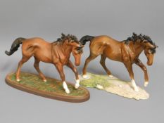 Two Doulton "The Winner" porcelain racehorses, one