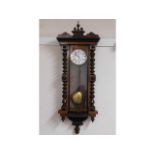 A large mahogany continental regulator clock, 51in