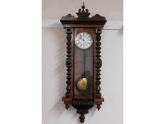 A large mahogany continental regulator clock, 51in
