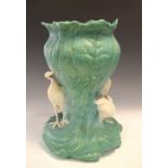 Bretby pottery jardinière, the leaf moulded central section surrounded by three white cranes,