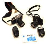 Minolta X-700 and Pentax Asahi SP1000 35mm cameras with a small quantity of accessories and case