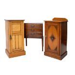 Two early 20th Century pot cupboards, together with a mid 20th Century three drawer music cabinet