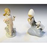 Two Lladro porcelain figures, both with boxes Condition: Girl holding flowers - some petals have