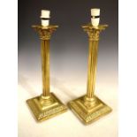 Pair of late Victorian brass Corinthian column table lamps with later electric fitting, 45.5cm