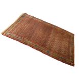 Middle Eastern wool rug, the brick-red field with small allover boteh within multi borders,116cm x