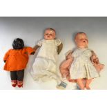 Three vintage composite headed dolls, all in various clothing, the tallest approximately 39cm