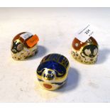 Three Royal Crown Derby paperweights comprising two ladybirds and Millennium Bug, three boxes