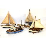 Three model boats, together with a pond yacht and an incomplete aerokits torpedo boat kit Condition: