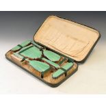 Art Deco silver-plated and enamel dressing table set, within case Condition: Various staining to