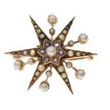 Unmarked yellow metal, seed pearl and red stones star brooch, 4cm diameter, 7.3g gross approx