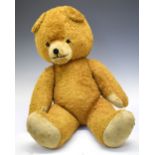 Large vintage golden mohair teddy bear, 71cm high Condition: Some wear and staining in places, small