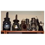 Seven various vintage lamps including examples by Wakefields Birmingham 1945 and Bladon Birmingham