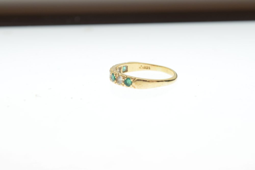 Yellow metal emerald and diamond seven-stone dress ring, shank stamped 18ct, size P½, 2.9g gross - Image 2 of 5