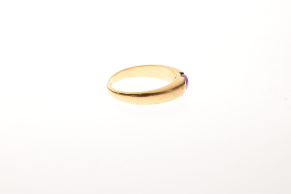 Yellow metal dress ring, the plain band set pink oval cabochon, shank stamped 18k, size Q½, 5.4g - Image 4 of 5