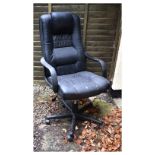 Modern black leatherette office swivel chair, 122cm high x 71cm x 66cm Condition: The surface