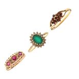 Three 9ct gold dress rings, one set three rubies, size K, the second set red stones, size O½, the