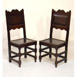 Pair of late 17th Century oak joined backstools, each with shaped top rail over fielded panelled