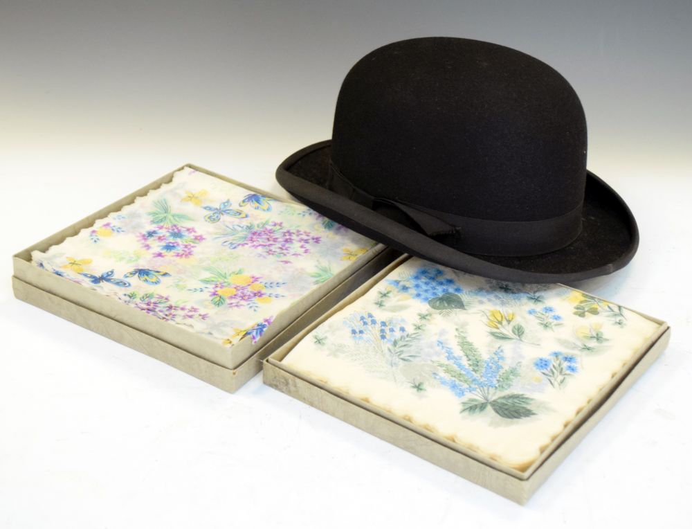 Dunn & Co bowler hat, together with two boxes of Liberty of London napkins Condition: **General