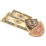Five assorted rugs: near pair of small Wilton 'Topkapi' machine-made wool rugs, 48cm x 99cm; two