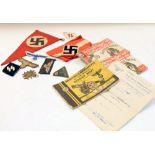 Quantity of Nazi German Third Reich miscellanea to include; fabric car pendant, sleeve/uniform