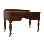 Victorian mahogany desk having five drawers and standing on four turned supports, 75cm x 122cm x