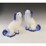 Pair of Staffordshire style dogs in blue and white glaze, 29cm high Condition: Light crazing to