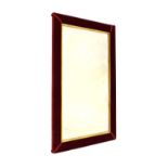 20th Century rectangular bevelled wall mirror having padded felt border, overall measurements 87cm x