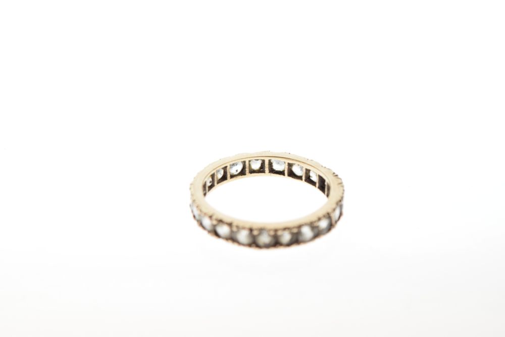 Unmarked yellow metal eternity ring set white stones, size M, 2.2g gross approx Condition: Light - Image 3 of 4