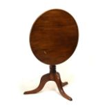 19th Century mahogany circular tilt-top table, standing on tripod base, 101.5cm x 71cm x 71cm