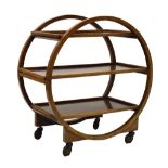 1930's period Art Deco tea trolley of circular design and standing on four castors, 80cm x 76cm x