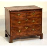 18th Century walnut chest of drawers of small proportions, the quartered crossbanded moulded top