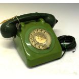 Green GPO style rotary dial telephone Condition: Some light scuffs and wear allover. Centre of