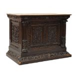 19th Century carved oak cabinet, having panelled door flanked by carved columns, 78cm x 41cm x