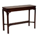 Reproduction mahogany console table of canted oblong form, 111cm x 41cm x 81.5cm high Condition: **