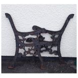 Pair of metal garden bench ends with floral decoration Condition: Bench ends only, but some of the