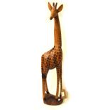 Carved figure of a giraffe, 88cm high Condition: One ear has broken off and been reglued, some