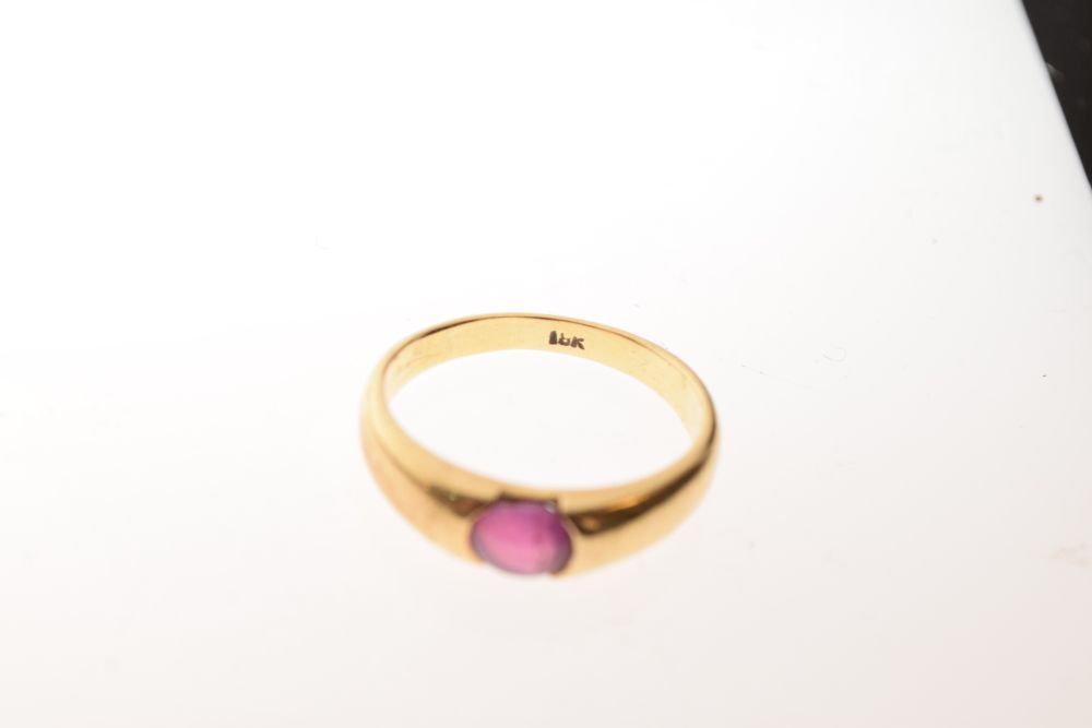 Yellow metal dress ring, the plain band set pink oval cabochon, shank stamped 18k, size Q½, 5.4g - Image 5 of 5