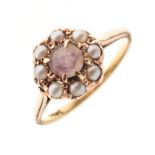 Yellow metal dress ring set amethyst-coloured stone within seed pearls, shank stamped 18ct, size
