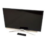 Samsung UE32M5520 32" television, on stand Condition: PAT tested only, sold as seen with no