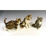 Three Jenny Winstanley ceramic cats, largest 24.5cm high Condition: Legs, tails and ears appear in