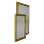 Two rectangular bevelled gilt framed mirrors, the largest measuring 73.5cm x 103cm, the smaller