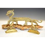 Large brass dragon, together with pair of brass peacock figures Condition: Wear to brass/rubbing