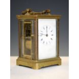 Late 19th Century brass cased carriage clock, with white Roman dial, 13cm high (excluding handles)