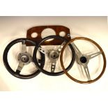 Motoring Interest - Three vintage steering wheels including wooden type reputedly from a MG motor
