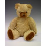 Vintage golden mohair teddy bear with growler and tail button, 46cm high Condition: **General