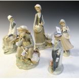 Five Lladro porcelain figure groups Condition: Bird resting on a tree trunk having broken tail. **