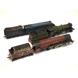 Three Hornby 00 gauge railway train set locomotives and tenders comprising: Sir Nigel Gresley,